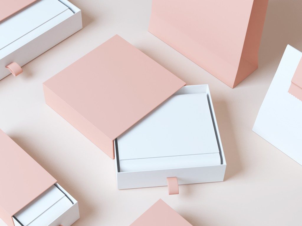 products packed in a pink and white paper boxer 