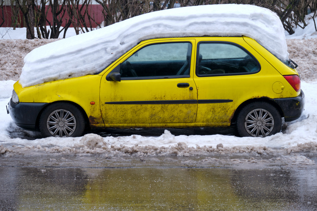 snow laden car